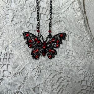 Butterfly necklace.